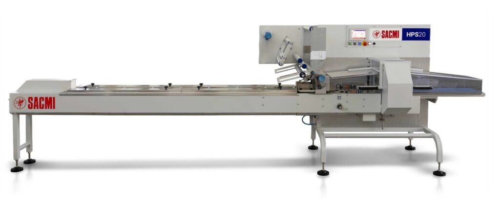SACMI HPS20 packaging machine with a long conveyor belt and control panel on the right side.